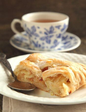 Slice of apple strudel and a cup of tea