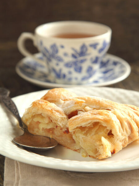 Slice of apple strudel and a cup of tea