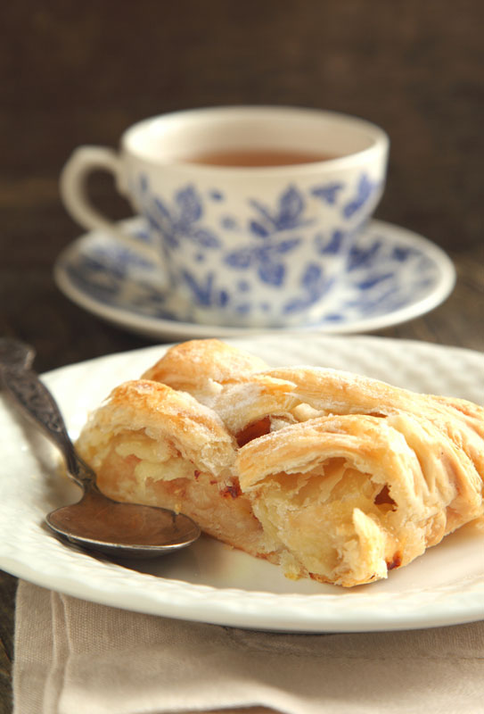 Slice of apple strudel and a cup of tea