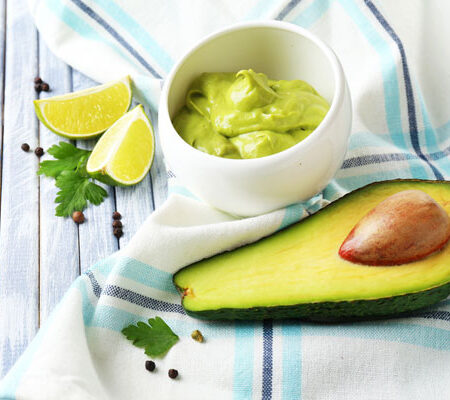 avocado, lime, and cup of avocado mayo.