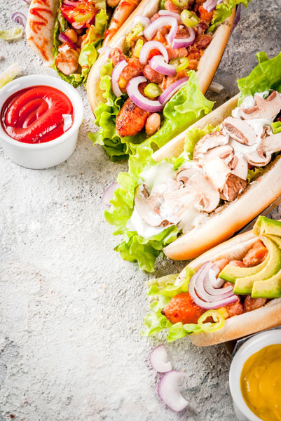 carrot hot dogs with various toppings