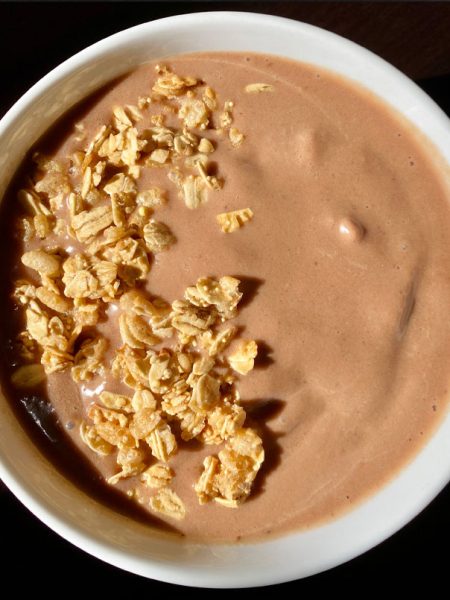 Chocolate Banana Smoothie Bowl topped with granola.