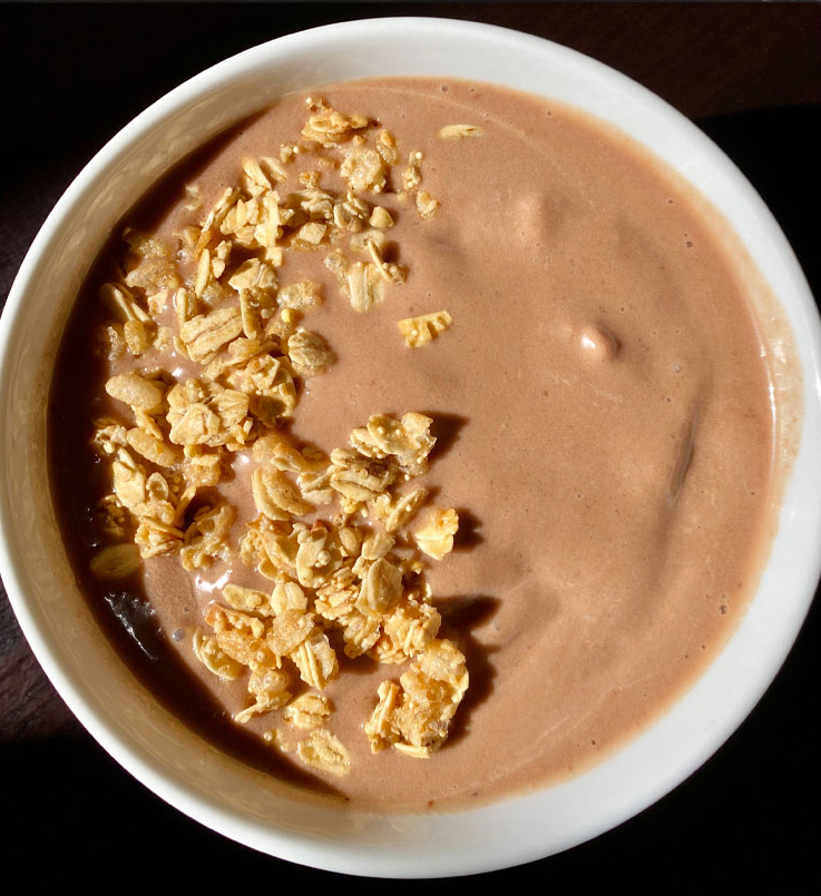Chocolate Banana Smoothie Bowl topped with granola.