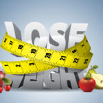 Tape measure squeezing the phrase "lose weight"