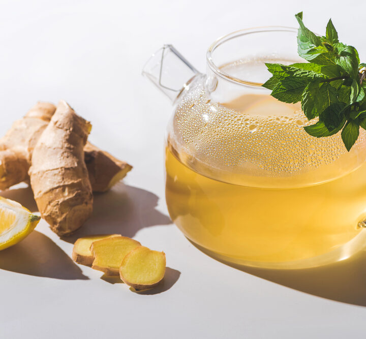 Pitcher of ginger tea with lemon slices