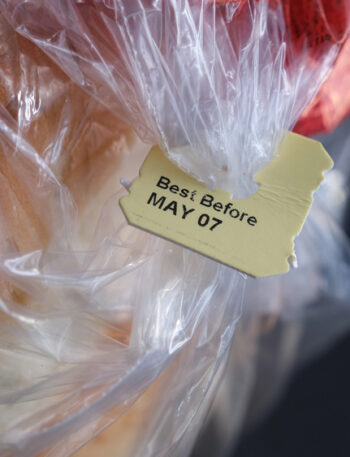 Loaf of bread featuring a "best by" tab.