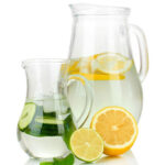Pitcher of water with lemon and limes