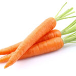 3 whole carrots on a white background.