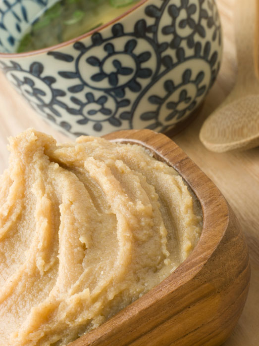 Miso paste in a wooden bowl.