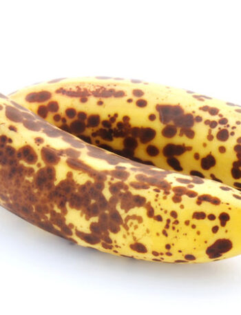 Two over-ripe bananas on a white background.
