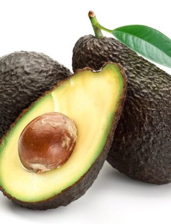 3 avocados on a white background with one avocado halved