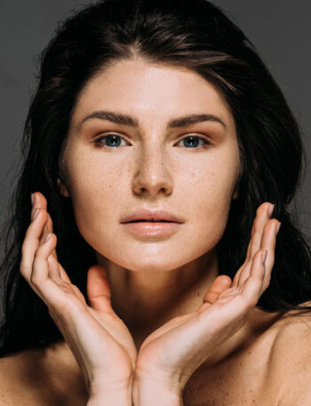 Young woman's face showing beautiful radiant skin.