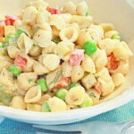 Seashells by the seashore pasta salad in a bowl.