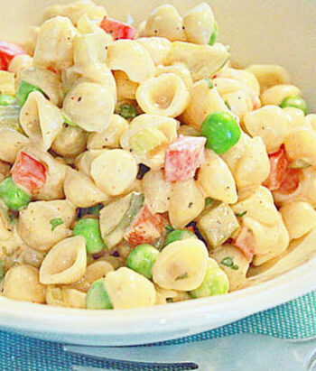 Seashells by the seashore pasta salad in a bowl.