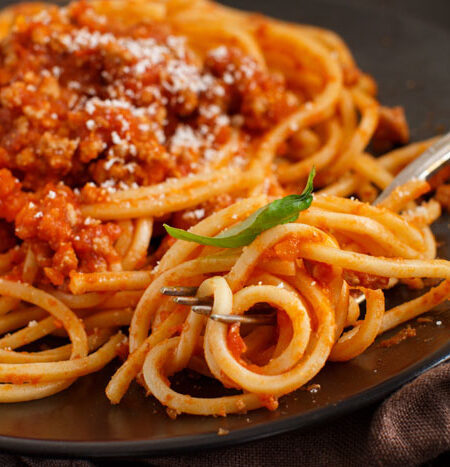 Plate of spaghetti bolognese.