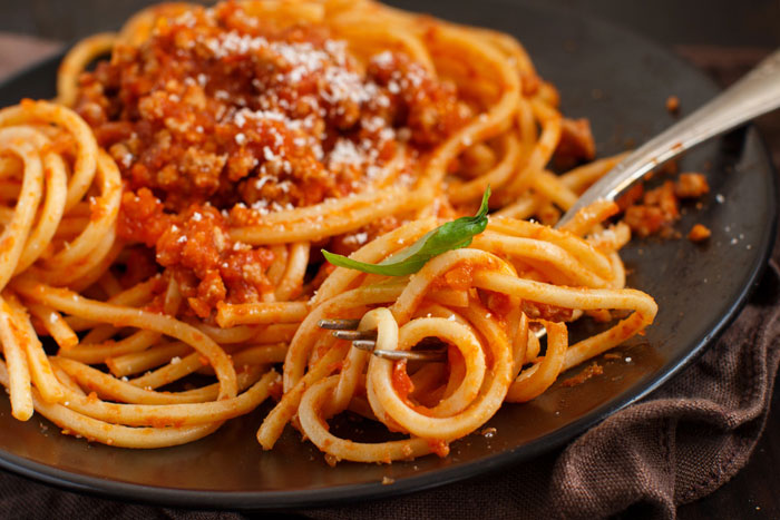 Plate of spaghetti bolognese.
