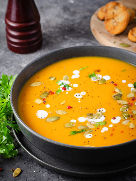 Bowl of Creamy Curried Zucchini soup.