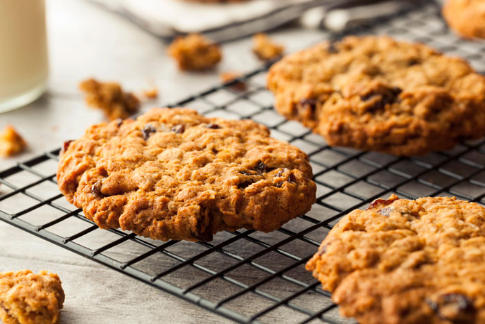 Oatmeal Cranberry Walnut Cookies on a cooling rack.