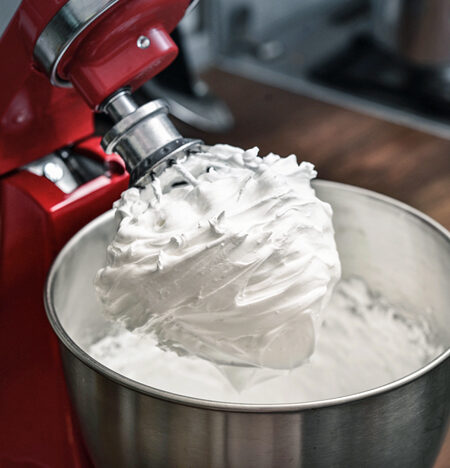 Whipped Cream in a stand mixer.