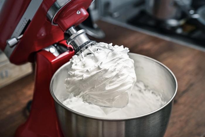 Whipped Cream in a stand mixer.